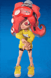 a cartoon character is wearing a yellow shirt that says tfc on it