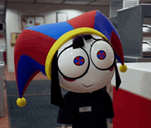 a cartoon character is wearing a jester hat and a black shirt