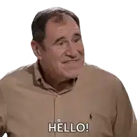 a man wearing a polo shirt is saying hello