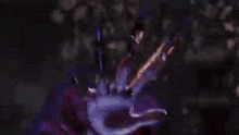 a close up of a person 's face with a purple background
