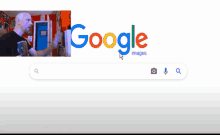 a blurry picture of a bald man 's face with a purple background