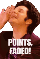 a man in a purple suit is laughing with the words points faded below him