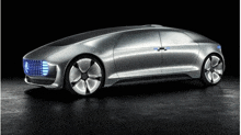 a silver car with a mercedes logo on the front