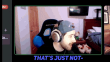 a man wearing headphones with the words that 's just not