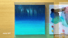 a painting by joony art is on a wooden surface
