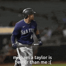 a baseball player wearing a seattle jersey is running on a field