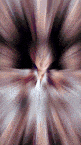 a blurry picture of a person 's face with a purple and white background