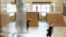 a person riding a skateboard in front of a sign that says no dogs