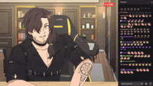 a man with a tattoo on his arm is sitting at a desk in front of a computer screen that says live