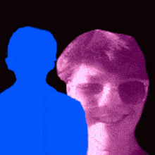 a silhouette of a woman wearing sunglasses is behind a silhouette of a man