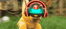 a dog wearing headphones has the number 2 on his head