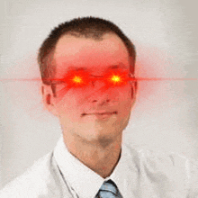 a man wearing glasses and a tie with red eyes .