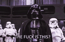 darth vader is standing in front of a group of stormtroopers and says the fuck is this ?
