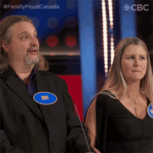 a man with a blue name tag that says jeff