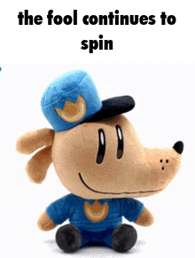 a stuffed animal with a blue hat and the words " the fool continues to spin "