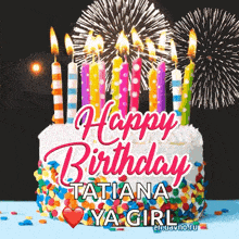 a birthday cake with candles and fireworks behind it and the words happy birthday tatiana ya girl