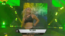 a female wrestler with the name tay conti on the bottom