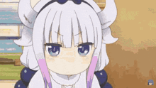 a close up of a cartoon girl with horns and a bow on her head .