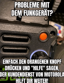 a black device with a red button that says " probleme mit dem funkgerät "