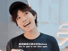 a man wearing a black shirt that says ' but i 'm glad to see ' on it