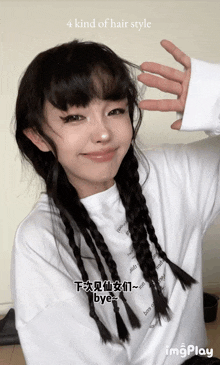 a girl with braids is wearing a white shirt that says bye on it