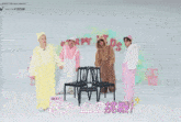 a person in a yellow costume is standing in front of a sign that says " japan 3rd mini album "