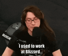 a man wearing glasses and headphones is talking into a microphone and says i used to work at blizzard