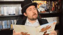Reading A Book Richard Parliament GIF - Reading A Book Richard Parliament Top Hat Gaming Man GIFs