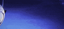 a cartoon character is fighting another character with a sword in the dark .