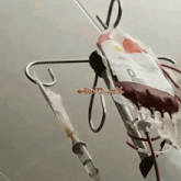 a bag of blood is attached to an iv with the bio dust x logo on it
