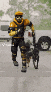 a man in a yellow and black outfit is running with a dog and the letters viggle.ai are on the bottom right