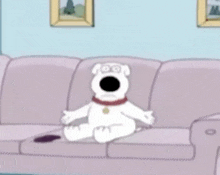 brian from family guy sits on a couch with a remote control in his hand
