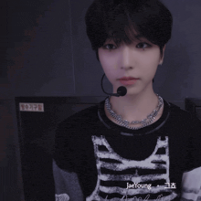 a close up of a person 's face with a microphone