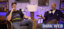 two men are sitting in front of microphones and the words dark web are on the bottom right