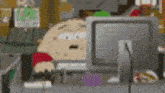 a cartoon character is sitting at a desk in front of a computer monitor .