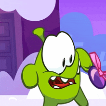 a green cartoon character is holding a purple object