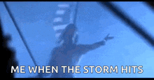 a silhouette of a person with the words `` me when the storm hits '' above them