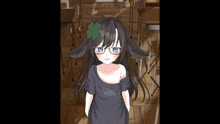 a girl with glasses and a clover in her hair is standing in a room with boxes .