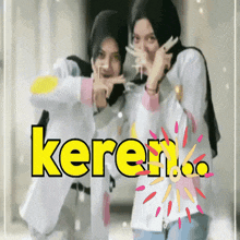 a couple of girls standing next to each other with the word keren on the bottom