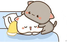 a cartoon of two cats laying on a bed with a yellow blanket .