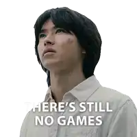 a man in a white shirt with the words there 's still no games above him