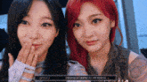 two girls with red hair are posing for a picture and one of them has the name ciselle on the bottom