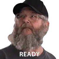 a man with a beard wearing glasses and a hat has the word ready written on his face