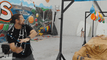 Popping Water Balloons How Ridiculous GIF - Popping Water Balloons How Ridiculous Hitting Water Balloons GIFs