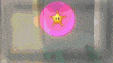 a pink circle with a yellow star in the middle of it