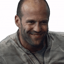 smiling lee christmas jason statham the expendables happy