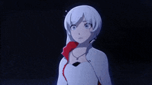 a woman with white hair and a red jacket is asking what the hell is this