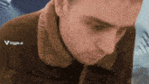 a close up of a man 's face with the words viggle.ai visible