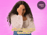 an ad for salon line shows a woman covering her face with her hand