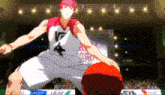 a basketball player with the number 4 on his jersey dribbles a ball
